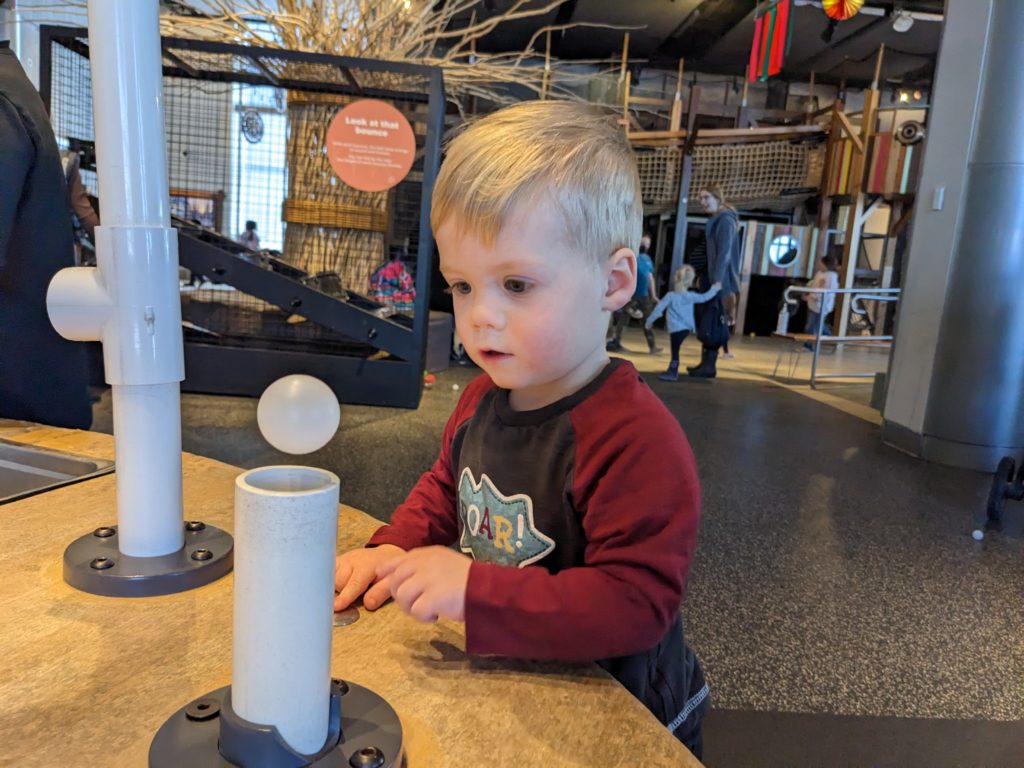 child in a play room - family photos